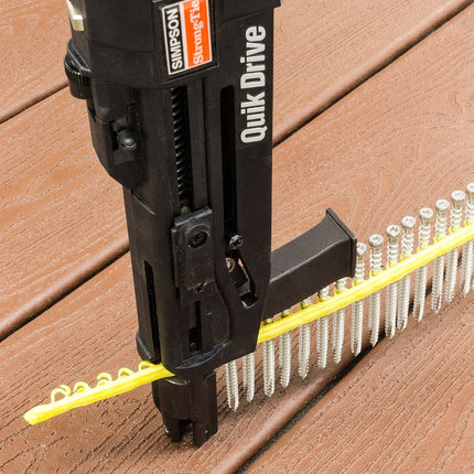 Deck-Drive DCU collated screws, stainless steel, being installed into a composite deck using the Quik Drive PRO300S tool; Stainless Steel DCU screw, for composite to wood applications.  Approved for use in Trex decking