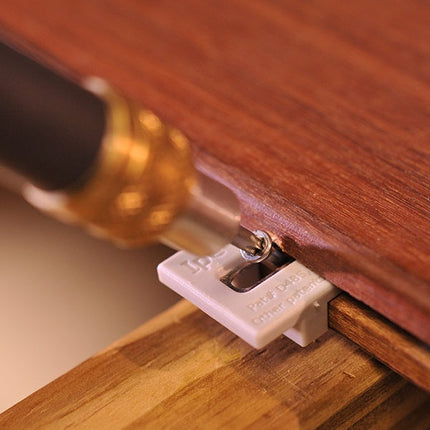 Ipe Clip Extreme KD Clip, Grey, For 1/4" gap spacing; Ipe Clip Extreme KD Grey, installed into a wood deck