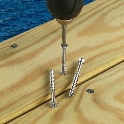 Stainless Steel Bugle Screw with Square Drive; Stainless steel bugle head screw being installed into a poolside deck.; Stainless bugle head screws on display and being installed into a ocean front deck.  2 screws are installed in the wood, one is being installed with a screw gun and 2 are on display on top of the wood deck boards.; Stainless steel bugle head screw being installed with a screw gun into a dock