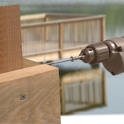 Stainless Steel Bugle Screw with Square Drive; Stainless steel bugle head screw being installed into a poolside deck.; Stainless bugle head screws on display and being installed into a ocean front deck.  2 screws are installed in the wood, one is being installed with a screw gun and 2 are on display on top of the wood deck boards.; Stainless steel bugle head screw being installed with a screw gun into a dock